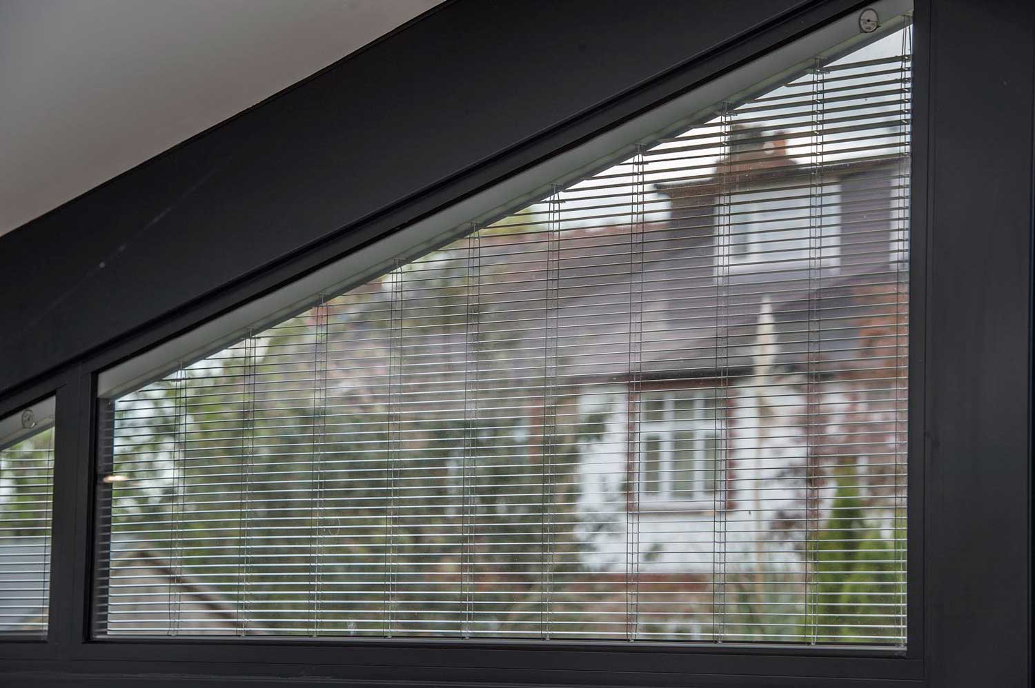 Blinds in Glass in Baldock: integral blinds in an angled gable window