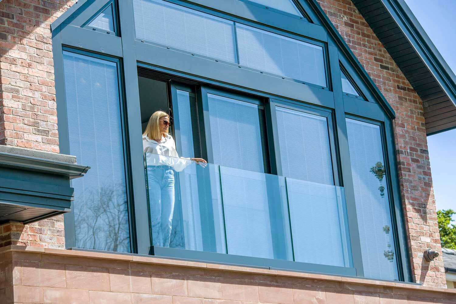 Blinds in Glass in Baldock: integral blinds in apex gable glazing above a balcony
