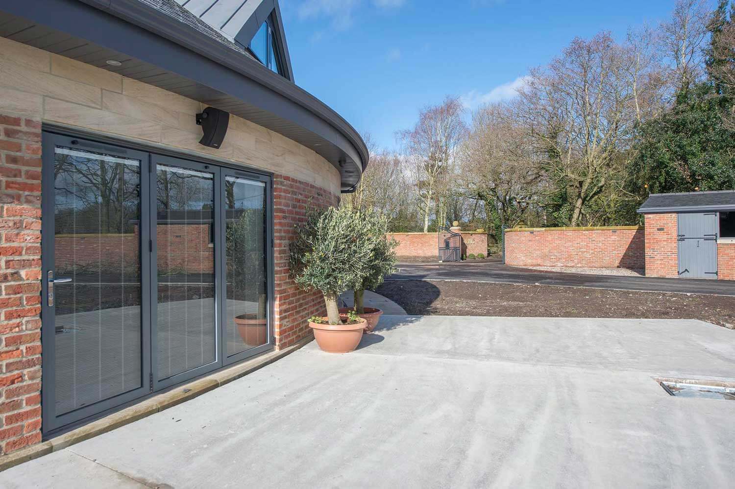 Blinds in Glass in Baldock: integral blinds in the bifold doors of a commercial property