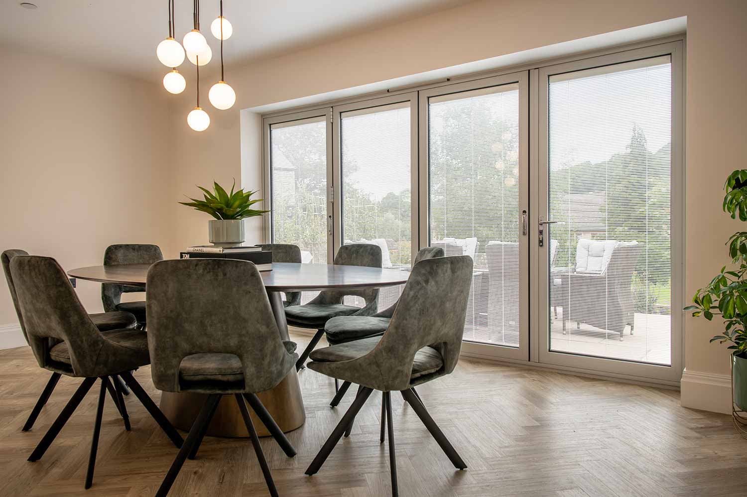 Blinds in Glass in Baldock: integral blinds in grey dining-room bifold doors