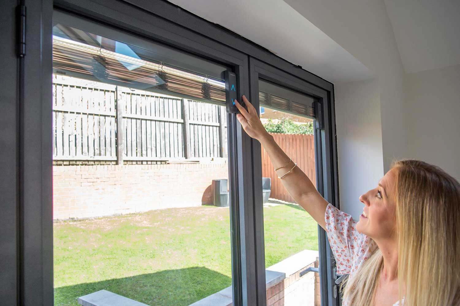 Blinds in Glass in Baldock: electric-controlled integral blinds in bifold doors