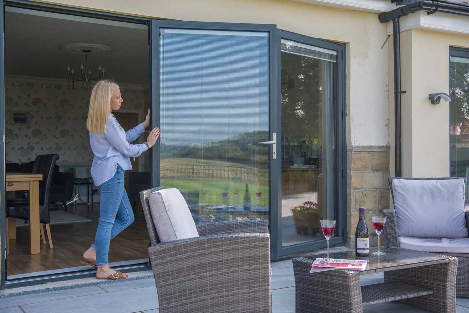 Blinds in Glass in Baldock: integral blinds in bifold doors onto a patio