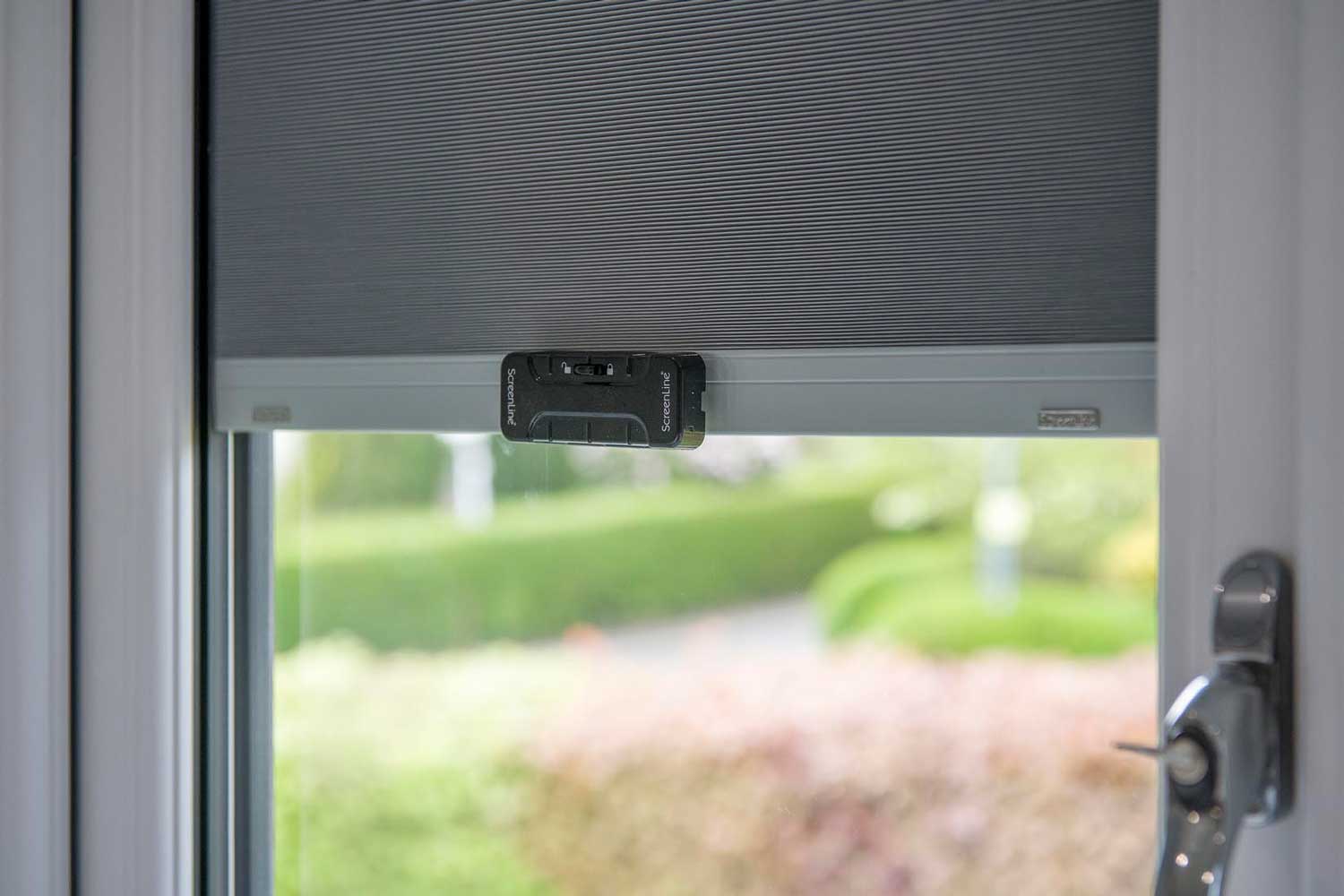 Blinds in Glass in Baldock: ScreenLine slider control for integral blinds